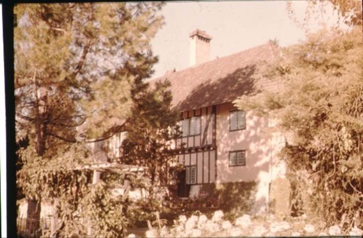 A house with trees around it
Description automatically generated with low confidence